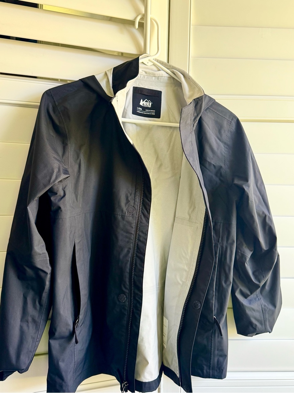 REI Kids Hooded Rain Jacket in Black and Light Gray